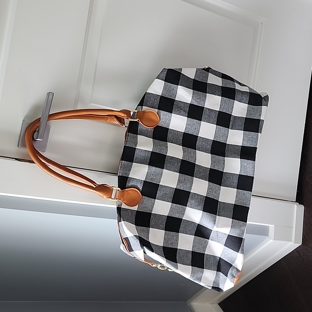 Black/white checkered print weekender travel bag with brown trim!